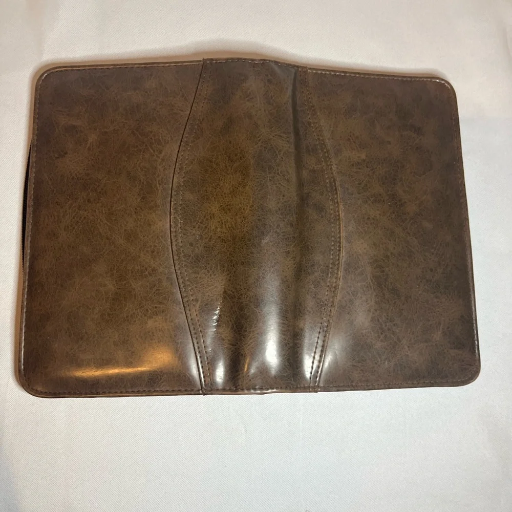 Day Timer Brown Folder With Some Papers